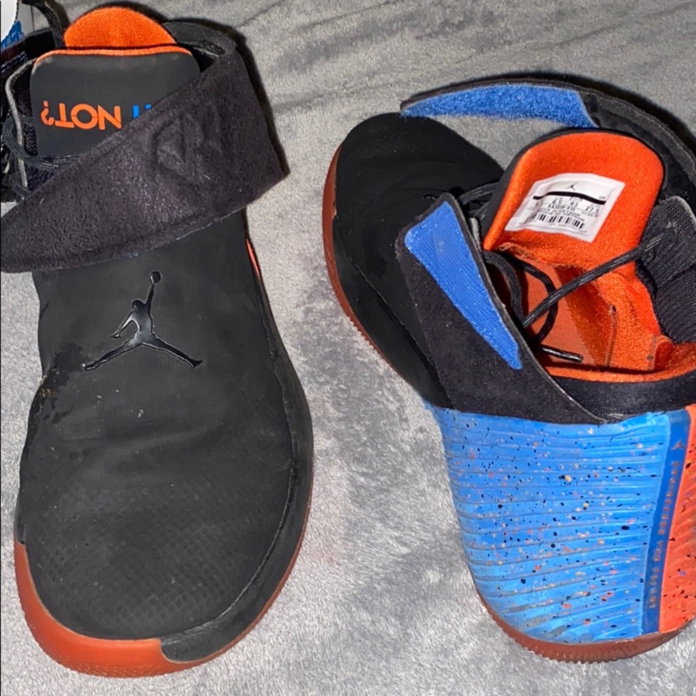 Black, oranges and blue why not jordans